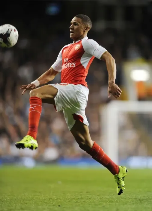 Framed Print : Arsenal's Kieran Gibbs Faces Off Against Tottenham Hotspur in Intense Capital One Cup Clash