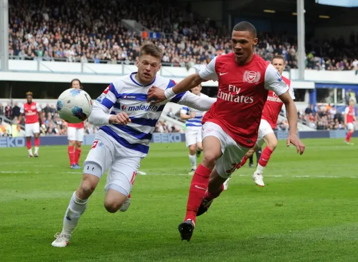 Framed Print : Arsenal's Kieran Gibbs Fends Off Jamie Mackie in Intense QPR Clash (2011-12)