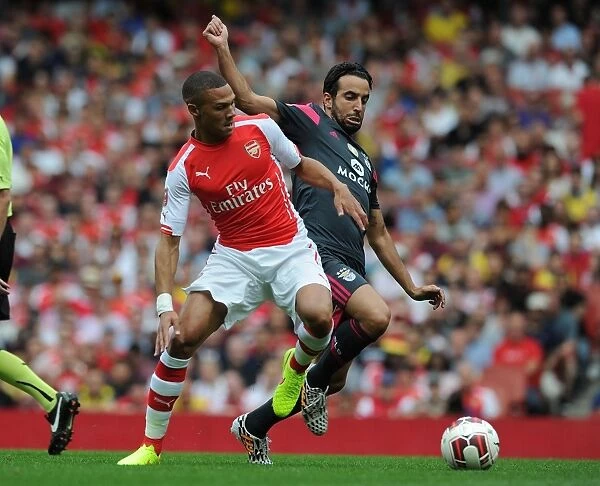 Arsenal's Kieran Gibbs Outmaneuvers Benfica's Ruben Amorim in Emirates Cup Clash