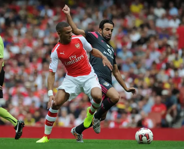 Framed Print : Arsenal's Kieran Gibbs Outmaneuvers Benfica's Ruben Amorim in Emirates Cup Clash Framed Print : Arsenal's Kieran Gibbs Outmaneuvers Benfica's Ruben Amorim in Emirates Cup Clash