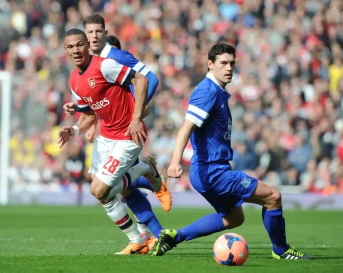 Framed Print : Arsenal's Kieran Gibbs Outmaneuvers Everton's Gareth Barry in FA Cup Quarter-Final Showdown Framed Print : Arsenal's Kieran Gibbs Outmaneuvers Everton's Gareth Barry in FA Cup Quarter-Final Showdown