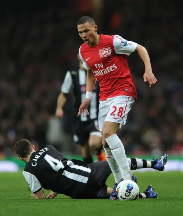 Framed Print : Arsenal's Kieran Gibbs Outmaneuvers Newcastle's Yohan Cabaye during the 2011-12 Premier League Match