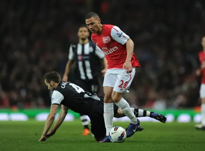 Framed Print : Arsenal's Kieran Gibbs Outwits Yohan Cabaye: A Flawless Moment of Skill from the 2011-12 Premier League Match