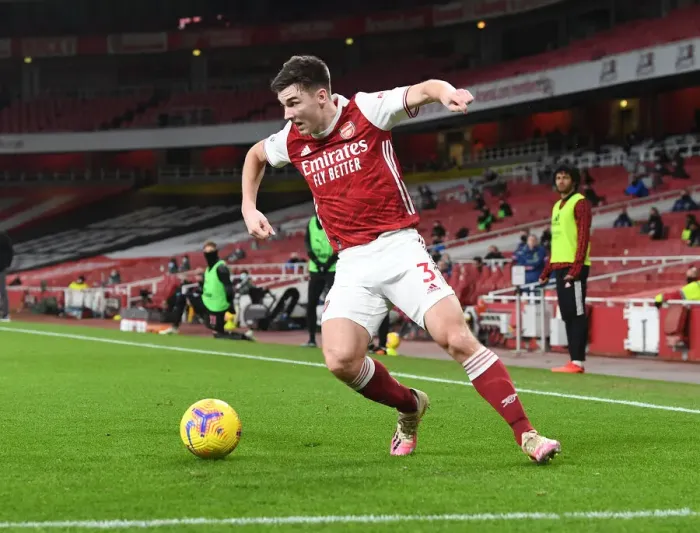 Framed Print : Arsenal's Kieran Tierney in Action at Empty Emirates Stadium Against Newcastle United (2020-21)