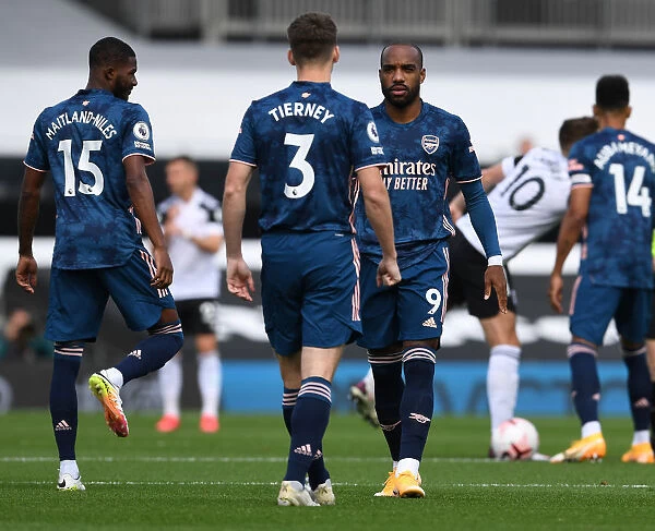 Arsenal's Kieran Tierney and Alex Lacazette in Action against Fulham, Premier League 2020-21