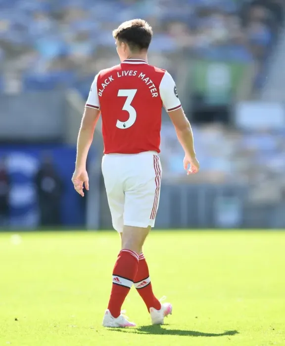 Framed Print : Arsenal's Kieran Tierney in Empty American Express Community Stadium: Brighton vs Arsenal, Premier League 2019-2020