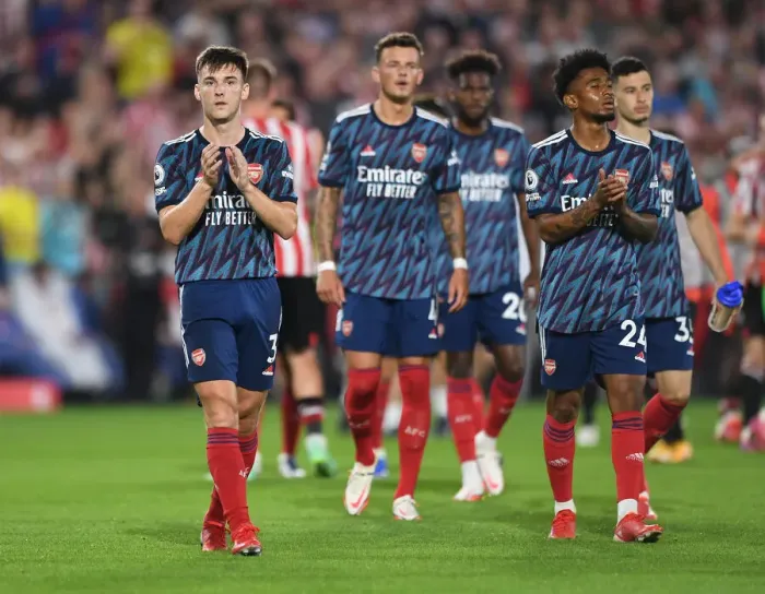 Framed Print : Arsenal's Kieran Tierney Celebrates with Fans after Brentford Victory Framed Print : Arsenal's Kieran Tierney Celebrates with Fans after Brentford Victory