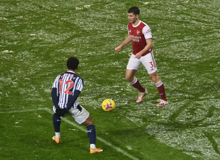 Framed Print : Arsenal's Kieran Tierney Clashes with Matheus Pereira in West Bromwich Albion vs Arsenal Premier League Match