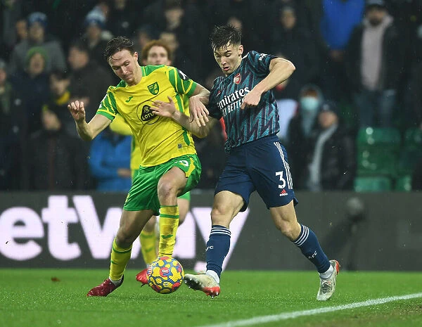Arsenal's Kieran Tierney Clashes with Norwich's Jacob Sorensen in Intense Premier League Battle