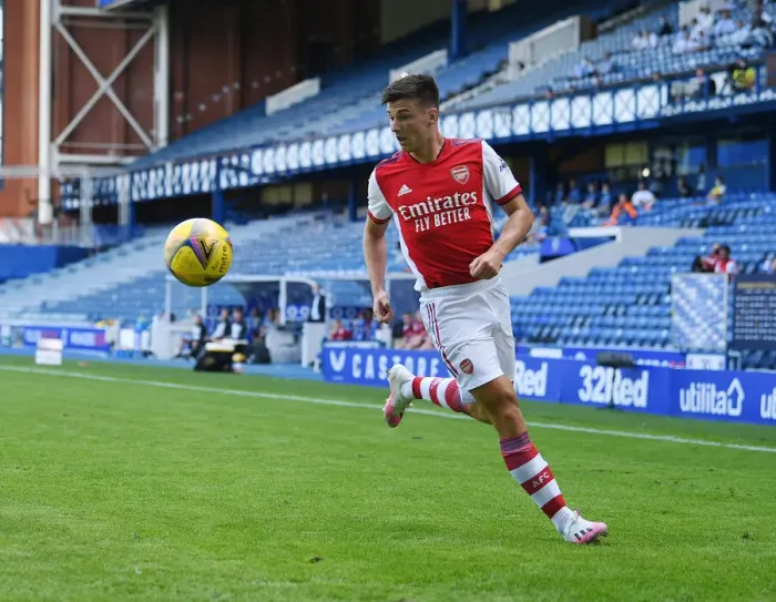 Framed Print : Arsenal's Kieran Tierney Clashes with Rangers at Ibrox Stadium