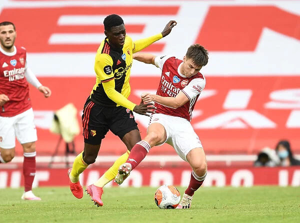 Arsenal's Kieran Tierney Clashes with Watford's Ismaila Sarr in Premier League Showdown