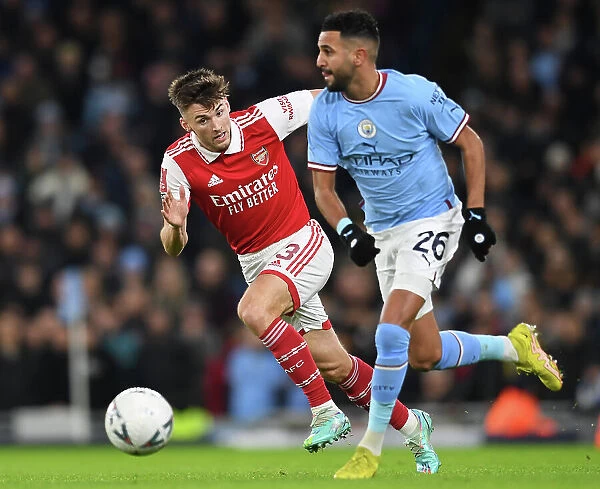 Arsenal's Kieran Tierney Closes In on Manchester City's Riyad Mahrez in FA Cup Clash