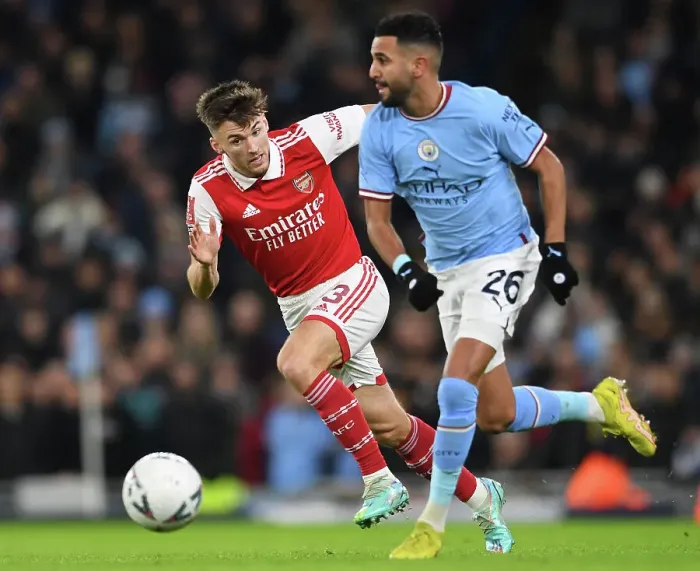 Framed Print : Arsenal's Kieran Tierney Closes In on Manchester City's Riyad Mahrez in FA Cup Clash Framed Print : Arsenal's Kieran Tierney Closes In on Manchester City's Riyad Mahrez in FA Cup Clash