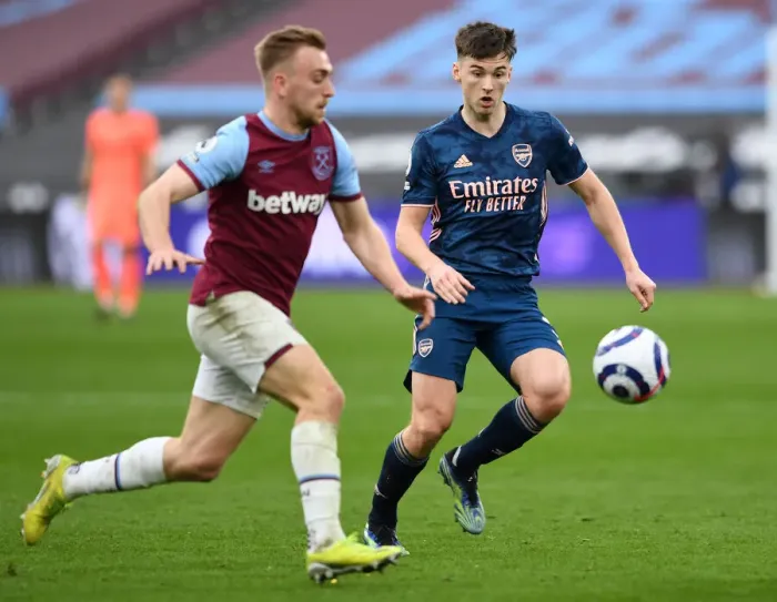 Framed Print : Arsenal's Kieran Tierney Closes In on West Ham's Jarrod Bowen in Intense Premier League Clash Framed Print : Arsenal's Kieran Tierney Closes In on West Ham's Jarrod Bowen in Intense Premier League Clash