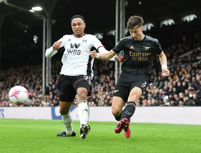 Framed Print : Arsenal's Kieran Tierney Faces Fulham's Kenny Tete in Premier League Clash Framed Print : Arsenal's Kieran Tierney Faces Fulham's Kenny Tete in Premier League Clash