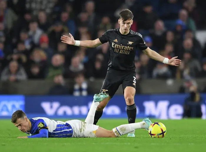 Framed Print : Arsenal's Kieran Tierney Faces Off Against Brighton's Solly March in Premier League Clash