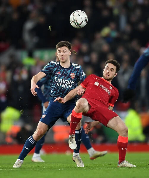 Arsenal's Kieran Tierney Faces Off Against Liverpool's Diogo Jota in Carabao Cup Semi-Final Clash
