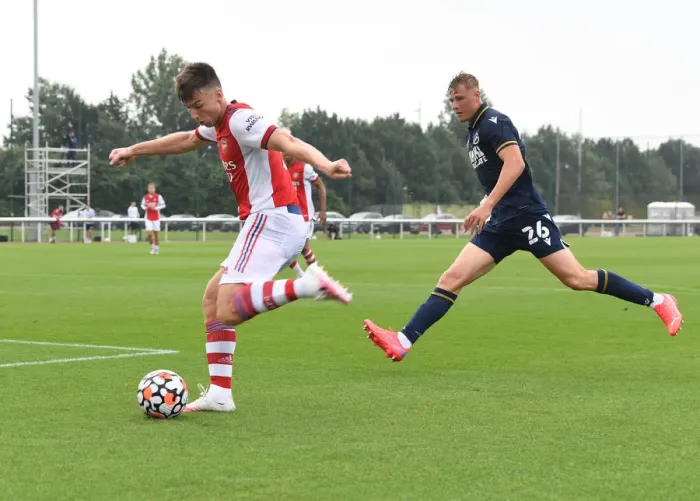 Framed Print : Arsenal's Kieran Tierney Faces Off Against Millwall's Daniel Ballard in Pre-Season Friendly