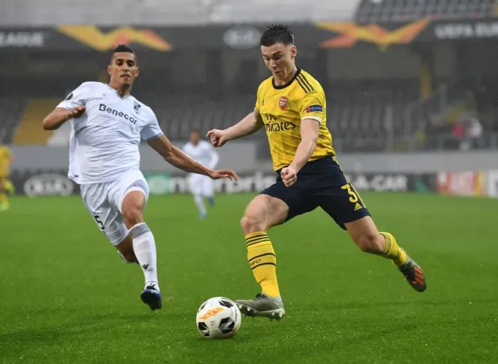 Framed Print : Arsenal's Kieran Tierney Faces Off Against Vitoria Guimaraes in Europa League Clash