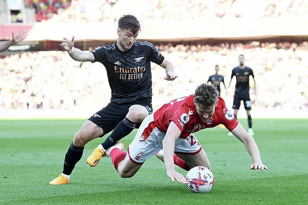 Arsenal's Kieran Tierney Fights for Possession Against Nottingham Forest in Premier League Clash