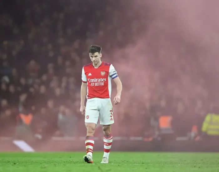 Framed Print : Arsenal's Kieran Tierney Goes Head-to-Head with Liverpool in Carabao Cup Semi-Final Clash