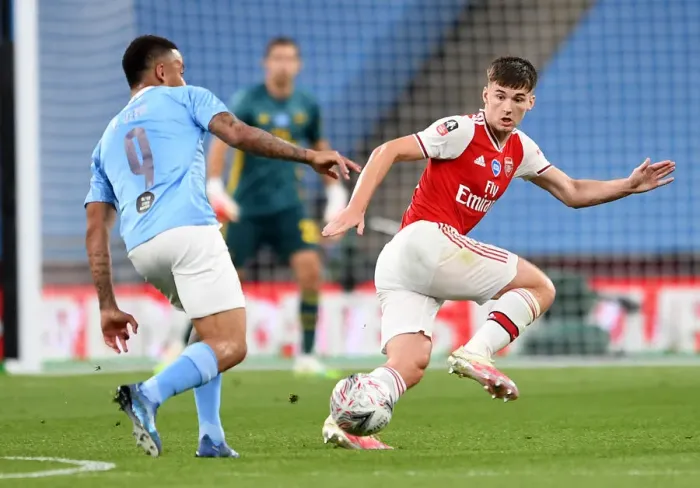 Framed Print : Arsenal's Kieran Tierney Goes Head-to-Head with Manchester City in FA Cup Semi-Final Clash