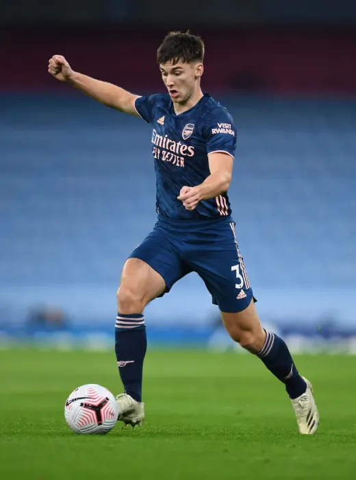 Framed Print : Arsenal's Kieran Tierney Goes Head-to-Head with Manchester City in Premier League Battle
