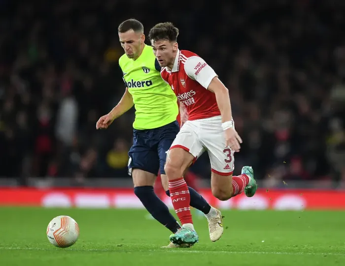 Framed Print : Arsenal's Kieran Tierney Goes Head-to-Head with Nikola Boranijasevic in UEFA Europa League Showdown Framed Print : Arsenal's Kieran Tierney Goes Head-to-Head with Nikola Boranijasevic in UEFA Europa League Showdown