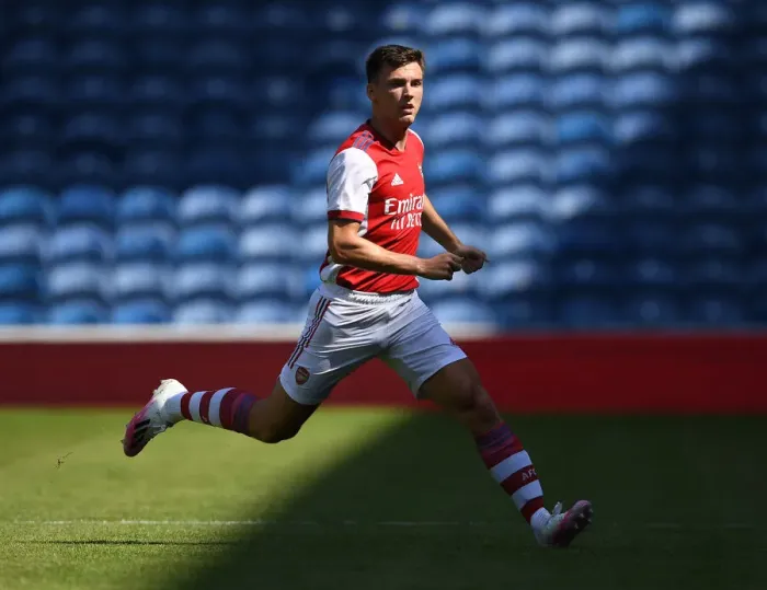 Framed Print : Arsenal's Kieran Tierney Goes Head-to-Head with Rangers at Ibrox Stadium