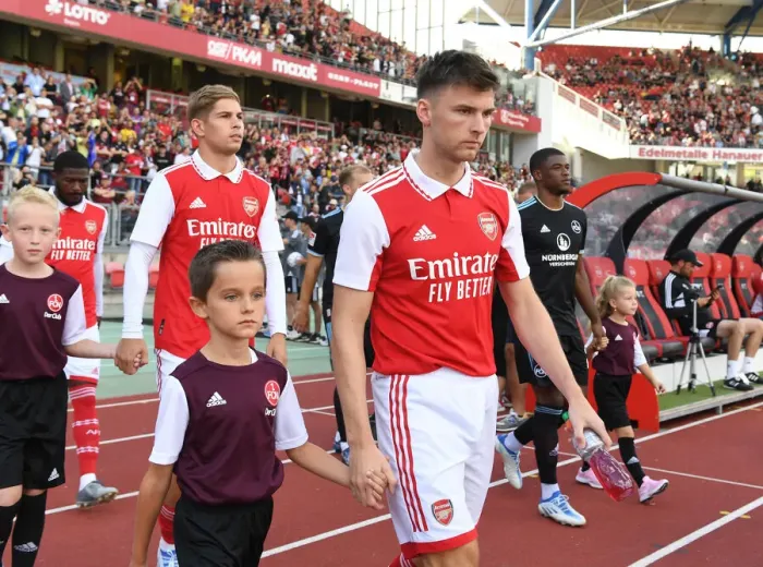 Framed Print : Arsenal's Kieran Tierney Meets Nurnberg Mascot Ahead of 2022 Pre-Season Clash Framed Print : Arsenal's Kieran Tierney Meets Nurnberg Mascot Ahead of 2022 Pre-Season Clash