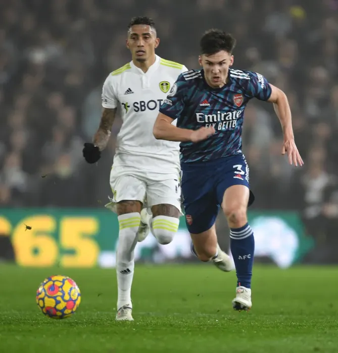 Framed Print : Arsenal's Kieran Tierney Outmaneuvers Leeds Raphinha in Premier League Clash Framed Print : Arsenal's Kieran Tierney Outmaneuvers Leeds Raphinha in Premier League Clash