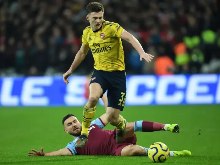 Framed Print : Arsenal's Kieran Tierney Outmaneuvers West Ham's Richard Snodgrass in Premier League Clash Framed Print : Arsenal's Kieran Tierney Outmaneuvers West Ham's Richard Snodgrass in Premier League Clash