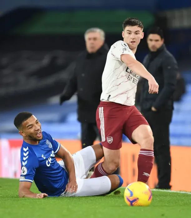 Framed Print : Arsenal's Kieran Tierney Outruns Everton's Mason Holgate in Premier League Clash