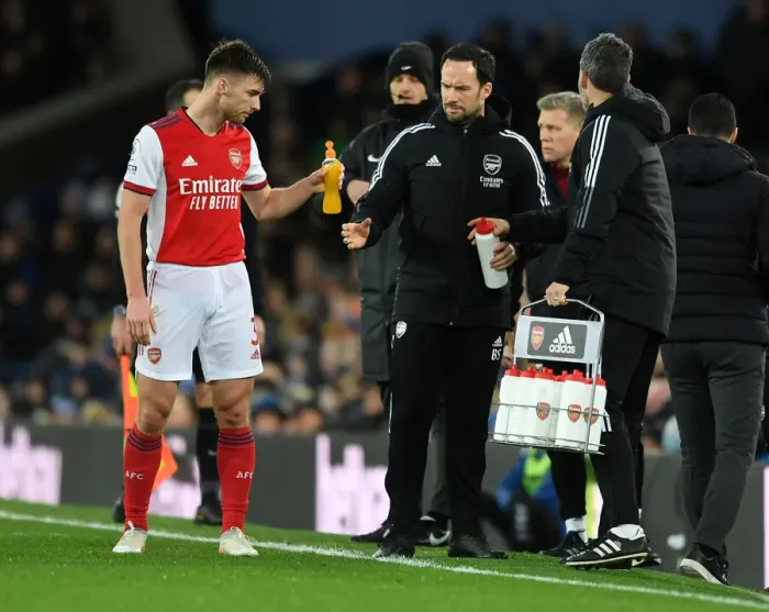 Framed Print : Arsenal's Kieran Tierney Receives Drink from Coach during Everton Match, Premier League 2020-21
