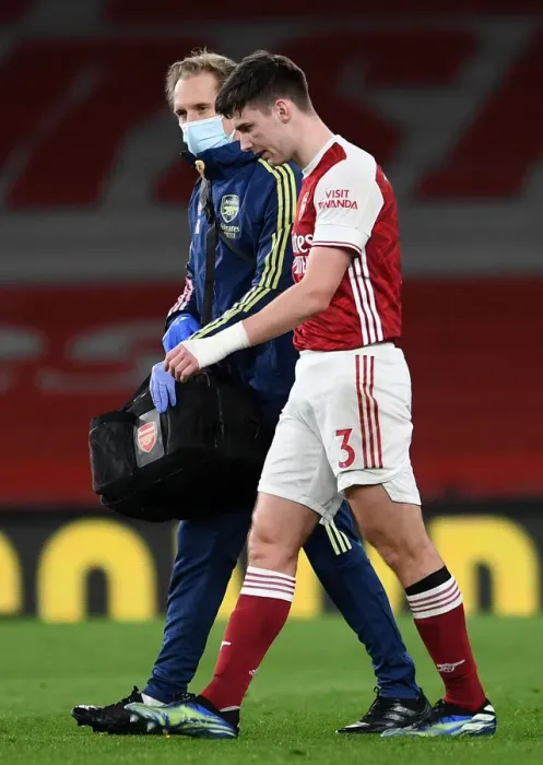 Framed Print : Arsenal's Kieran Tierney Suffers Injury Exit vs. Liverpool (2020-21) Framed Print : Arsenal's Kieran Tierney Suffers Injury Exit vs. Liverpool (2020-21)