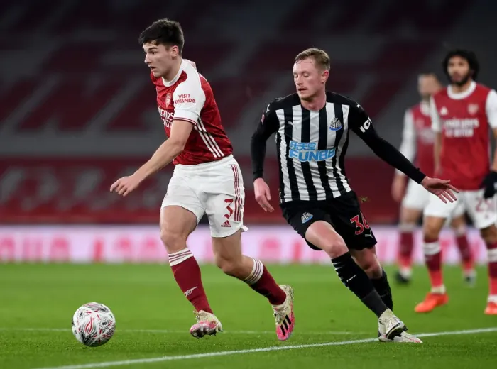 Framed Print : Arsenal's Kieran Tierney Tackles Newcastle's Sean Longstaff in FA Cup Clash
