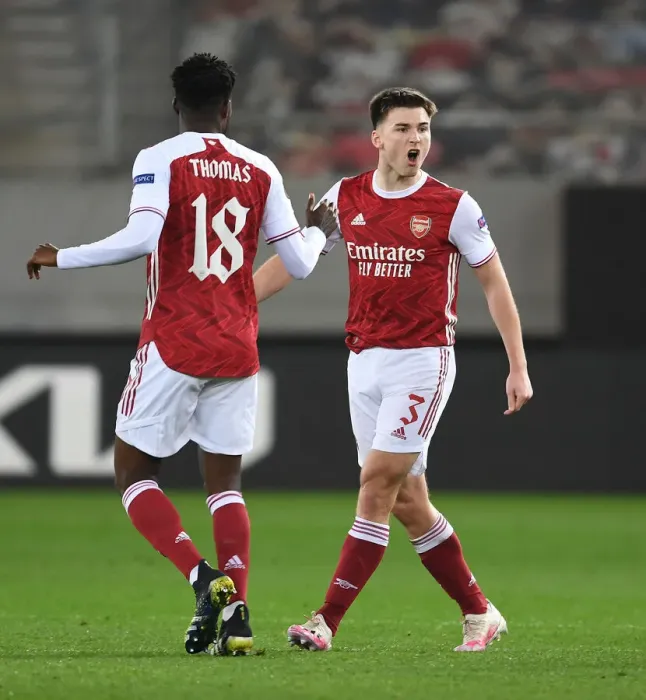 Framed Print : Arsenal's Kieran Tierney and Thomas Partey Celebrate Goals Against SL Benfica in Europa League