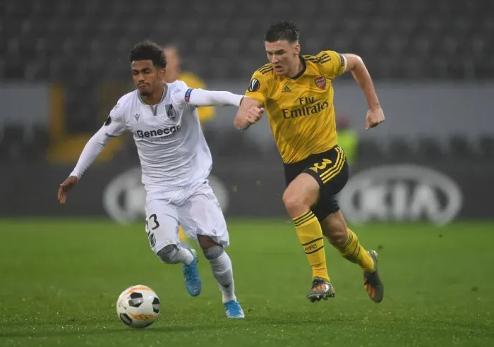 Framed Print : Arsenal's Kieran Tierney vs Marcus Edwards: Intense Europa League Showdown