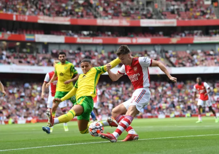 Framed Print : Arsenal's Kieran Tierney vs. Norwich's Max Aarons: A Premier League Battle at Emirates Stadium