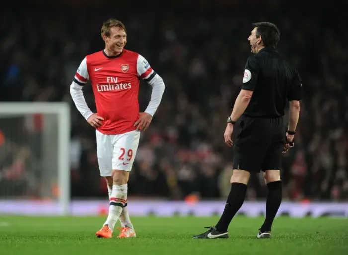 Framed Print : Arsenal's Kim Kallstrom Argues with Referee Lee Probert During Arsenal v Swansea City Match Framed Print : Arsenal's Kim Kallstrom Argues with Referee Lee Probert During Arsenal v Swansea City Match