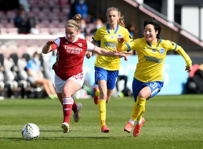 Framed Print : Arsenal's Kim Little Faces Off Against Brighton's Lee Geum-min in Empty FA WSL Match