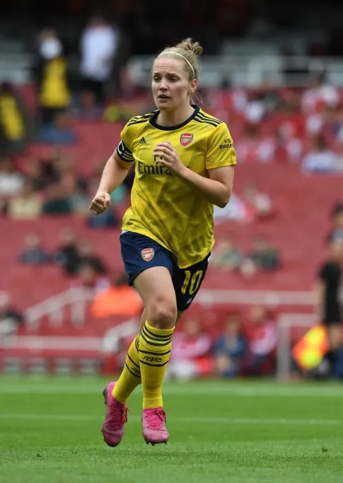 Framed Print : Arsenal's Kim Little Faces Off Against FC Bayern Munich at Emirates Cup