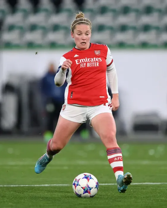 Framed Print : Arsenal's Kim Little Faces Off Against VfL Wolfsburg in UEFA Women's Champions League Quarterfinals