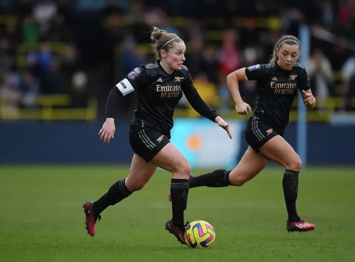 Framed Print : Arsenal's Kim Little Goes Head-to-Head with Manchester City in FA Women's Super League Clash