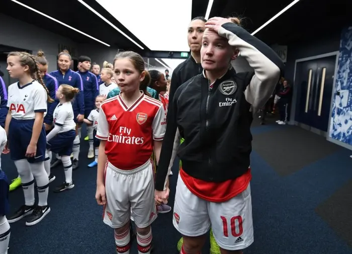 Framed Print : Arsenal's Kim Little and Mascot Before Tottenham Clash in FA Womens Super League Framed Print : Arsenal's Kim Little and Mascot Before Tottenham Clash in FA Womens Super League