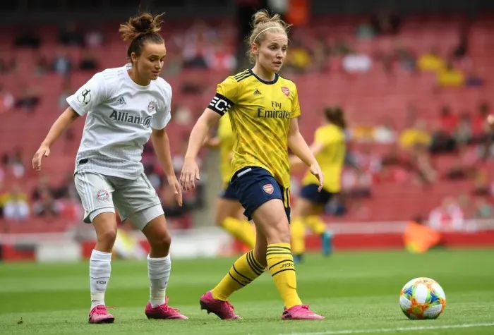 Framed Print : Arsenal's Kim Little Overpowers Bayern's Lina Magull in Emirates Cup Clash