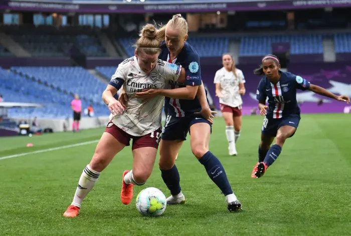 Framed Print : Arsenal's Kim Little Stands Strong Against PSG in UEFA Women's Champions League Quarterfinal Framed Print : Arsenal's Kim Little Stands Strong Against PSG in UEFA Women's Champions League Quarterfinal