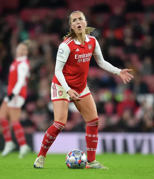 Framed Print : Arsenal's Kim Little: Unwavering Focus Ahead of Champions League Showdown with Olympique Lyonnais (2022-23)