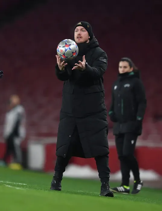 Framed Print : Arsenal's Kim Little: Unwavering Focus Amidst Champions League Showdown against Olympique Lyonnais