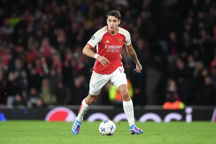 Framed Print : Arsenal's Kiwior Charges Forward in UCL Showdown vs Sevilla at Emirates Stadium Framed Print : Arsenal's Kiwior Charges Forward in UCL Showdown vs Sevilla at Emirates Stadium